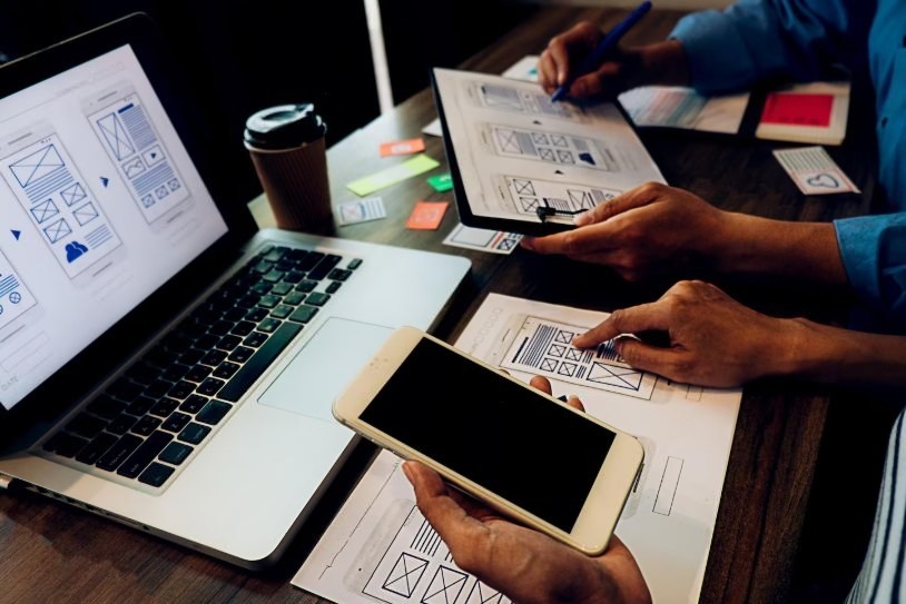A website project being planned across desktop and mobile screens